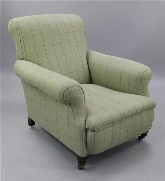 A Victorian tweed fabric upholstered armchair,